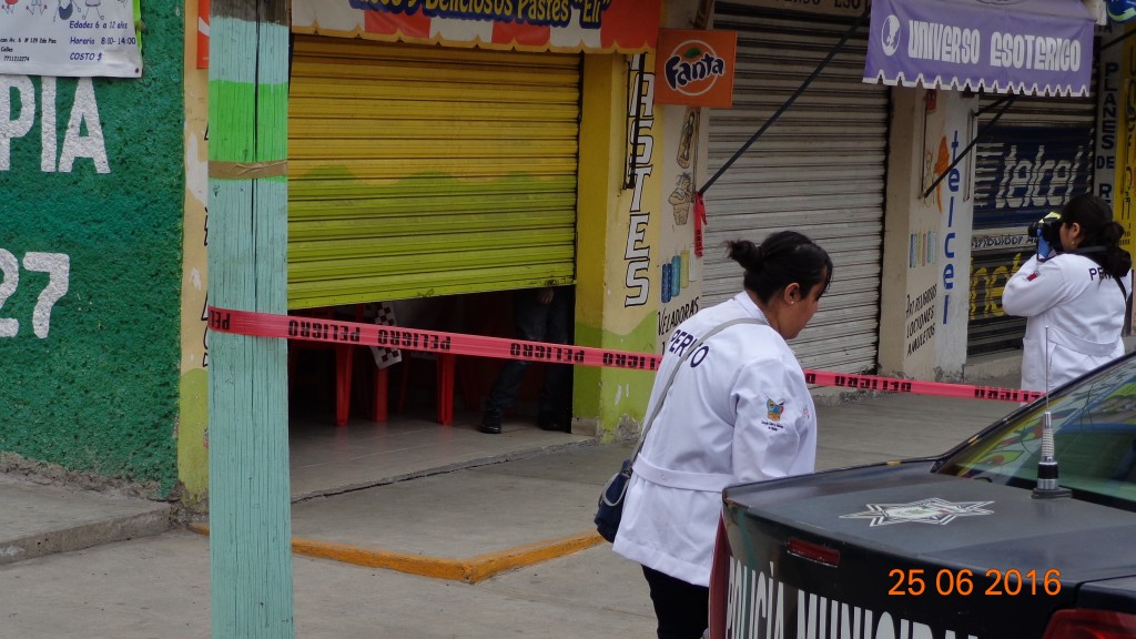 Jovencito hallado muerto en un local